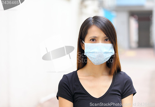 Image of Asian woman with face mask