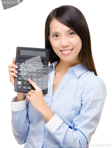 Image of Asian woman press the calculator 