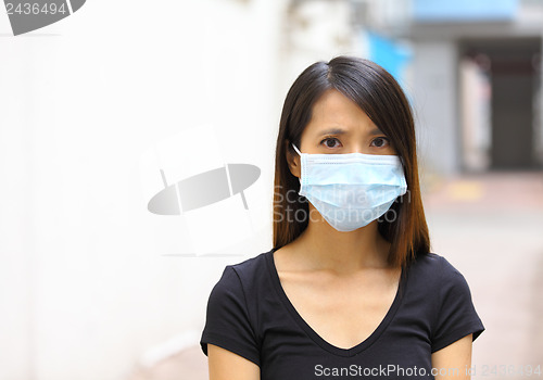 Image of Asian woman wear protective face mask