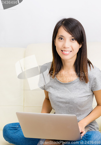 Image of Asian woman with laptop