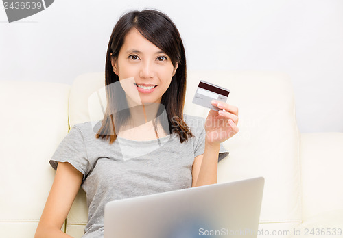 Image of Asian woman with laptop for online shopping