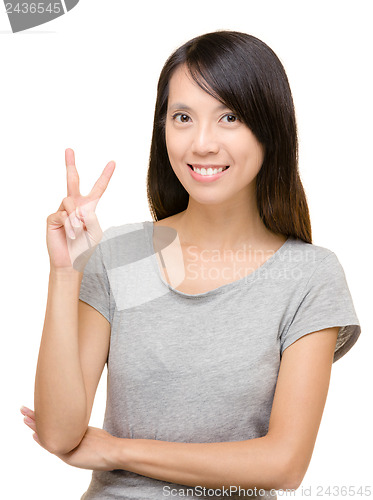 Image of Asian woman showing victory sign