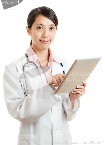 Image of Asian female doctor with digital tablet