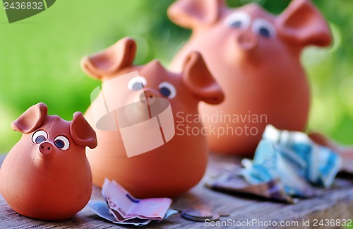 Image of Three ceramic piggy banks