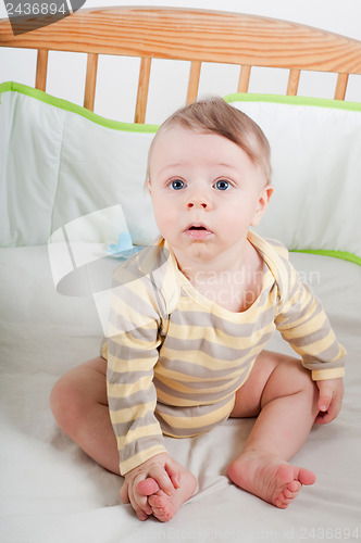 Image of Baby boy in cradle