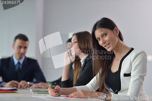 Image of business people in a meeting at office