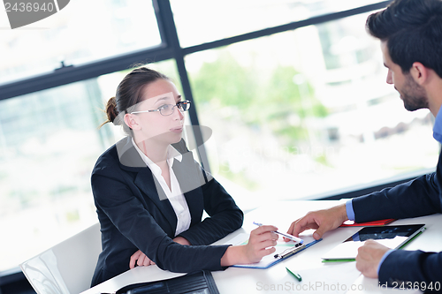 Image of business people in a meeting at office