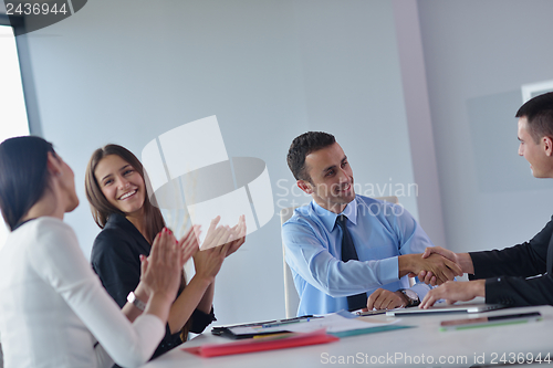 Image of business people in a meeting at office