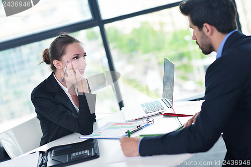 Image of business people in a meeting at office