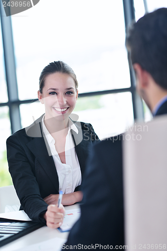 Image of business people in a meeting at office