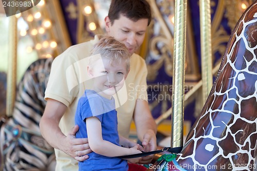 Image of family in amusement park