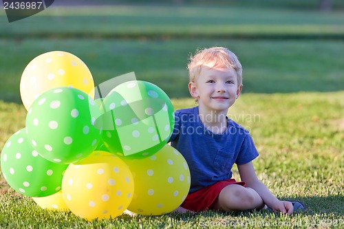 Image of boy with balloons