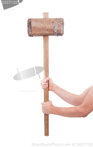 Image of Man with very old wooden hammer isolated 