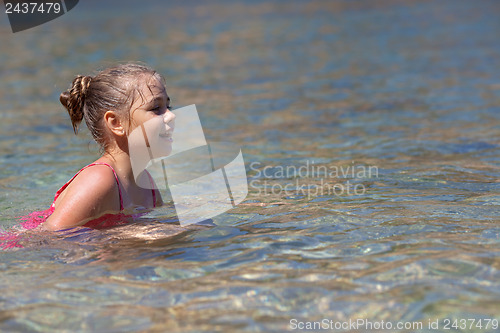 Image of Little girl in the sea