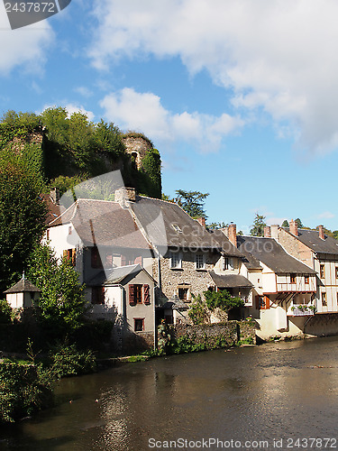Image of Segur le Chateau village and Auvezere river, France