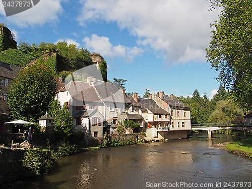 Image of Segur le Chateau village and Auvezere river, France