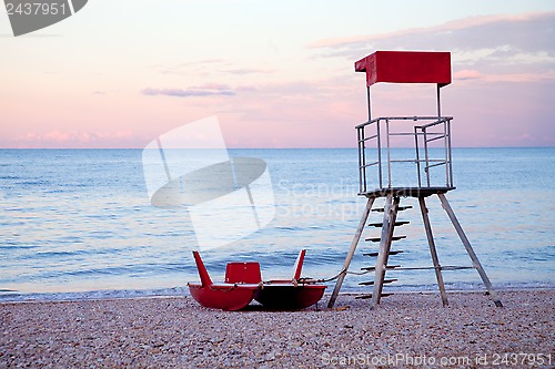 Image of abandoned lifeguard tower and boat 