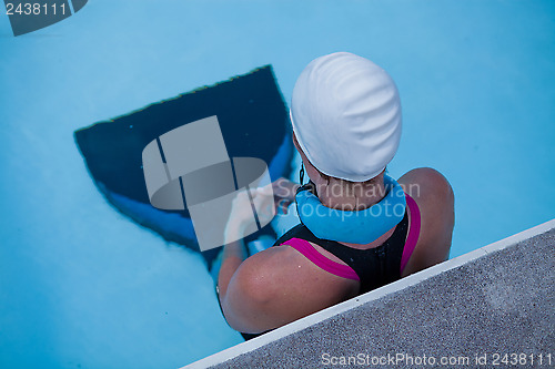 Image of Female freediver at pool edge