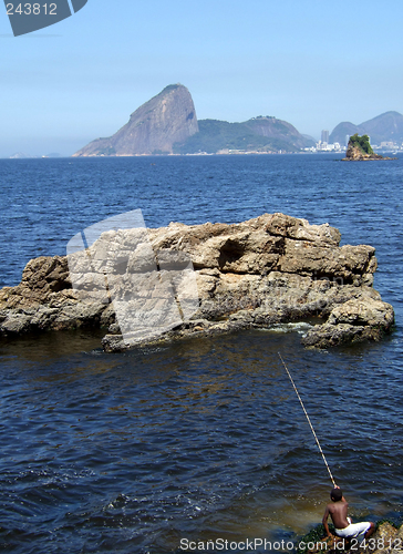 Image of Child fishing in the sea