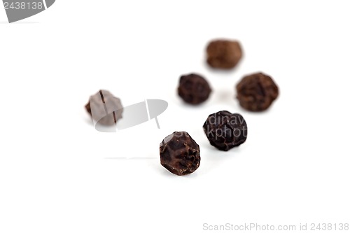 Image of black peppercorns