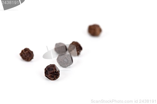 Image of black peppercorns