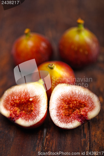 Image of fresh figs over old wood
