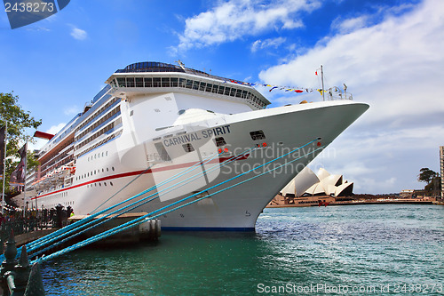 Image of Passengers ready for vacation await the embarking of Carnival Sp