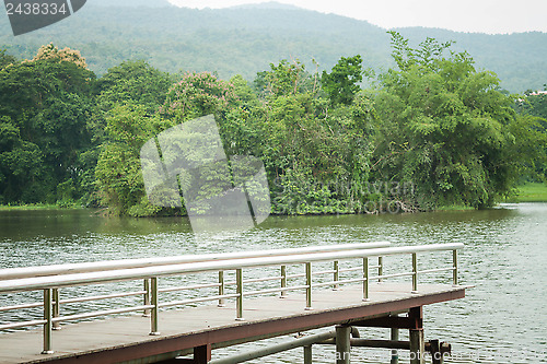 Image of Metal bridge into the pond