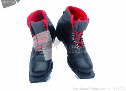 Image of Black ski boots on a white background.