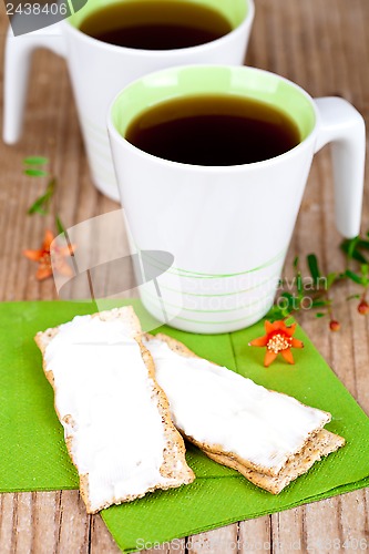 Image of tea and crackers with cream cheese