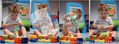Image of A funny baby boy trying to dress socks