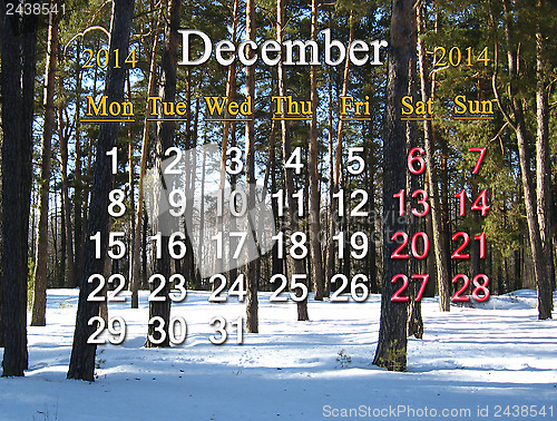 Image of calendar for December of 2014 with forest