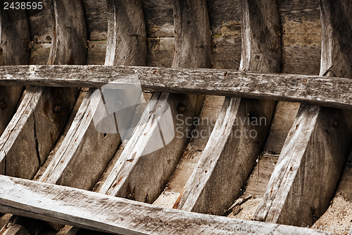 Image of Skeleton of an old wooden fishing boat. Thailand