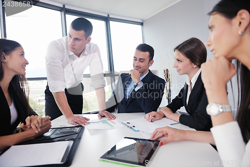 Image of business people in a meeting at office