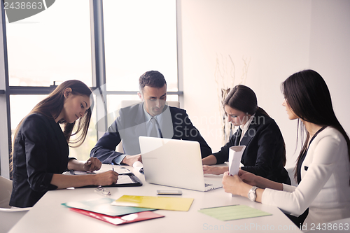 Image of business people in a meeting at office