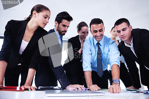 Image of business people in a meeting at office