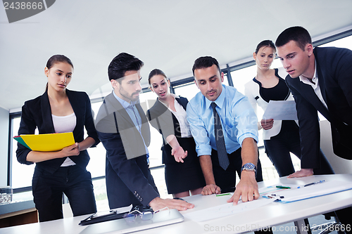 Image of business people in a meeting at office