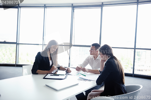 Image of business people in a meeting at office