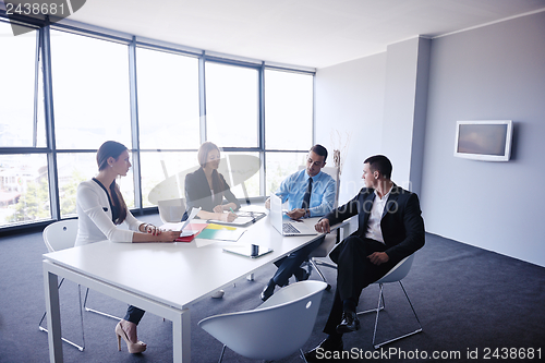 Image of business people in a meeting at office