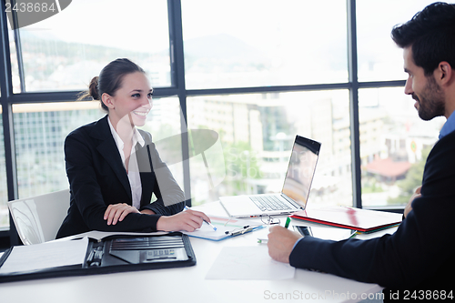 Image of business people in a meeting at office