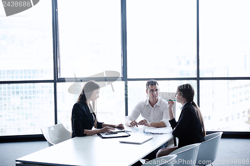 Image of business people in a meeting at office