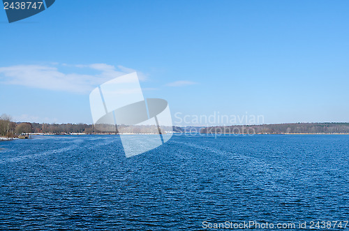 Image of Deep blue horizon over winter river or lake surface