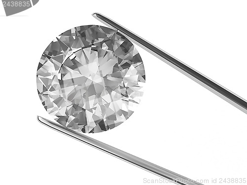 Image of Close-up view on diamond in tweezers isolated on white