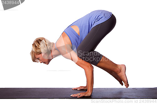 Image of Yoga handstand by beautiful woman