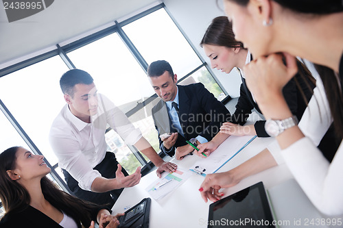 Image of business people in a meeting at office