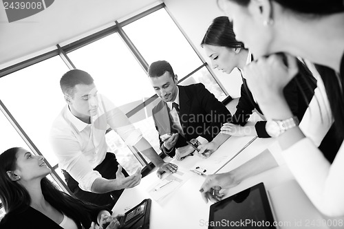 Image of business people in a meeting at office