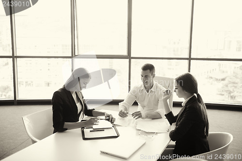 Image of business people in a meeting at office