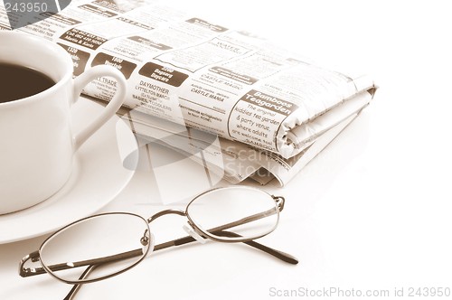 Image of Coffe and Newspaper