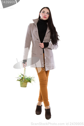 Image of Pretty brunette in coat