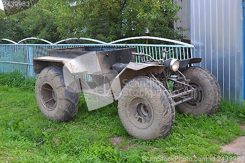 Image of the old ATV in the village